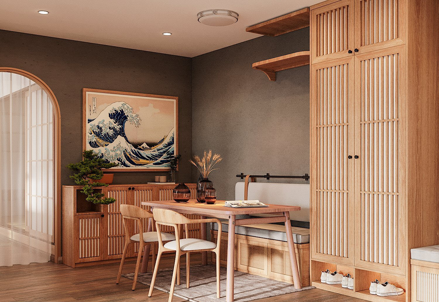 Phòng ăn gọn xinh, ấm cúng với băng ghế dài êm ái. Tường màu xám tạo sự tách biệt tương đối cho phòng ăn, là phông nền hoàn hảo cho tranh tường, chậu cây xanh điểm nhấn.