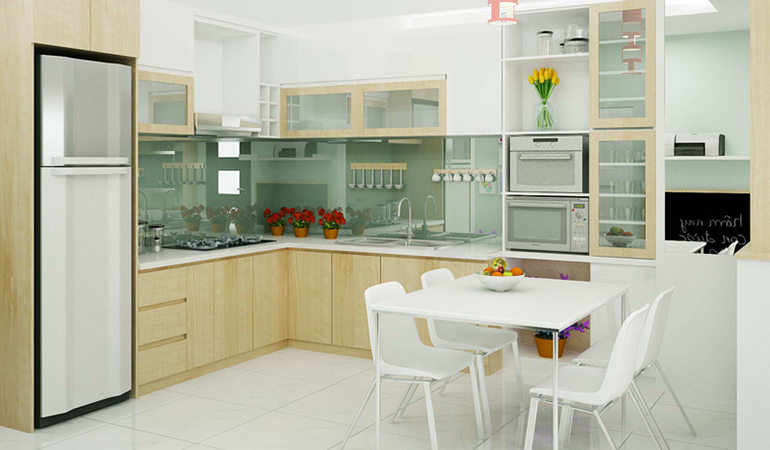 Phòng bếp kết hợp phòng ăn khá rộng rãi, bài trí gọn gàng, đẹp mắt. Bộ bàn ăn màu trắng tinh khôi dành cho gia đình nhỏ trở thành điểm nhấn cực hút mắt.