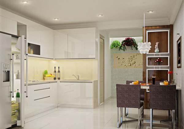 Không gian bếp nấu và phòng ăn tích hợp trong cùng một mặt sàn, phân tách tương đối bởi hai tông màu trắng - nâu tương phản nhẹ nhàng.